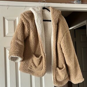 reversible fluffy brown and white jacket